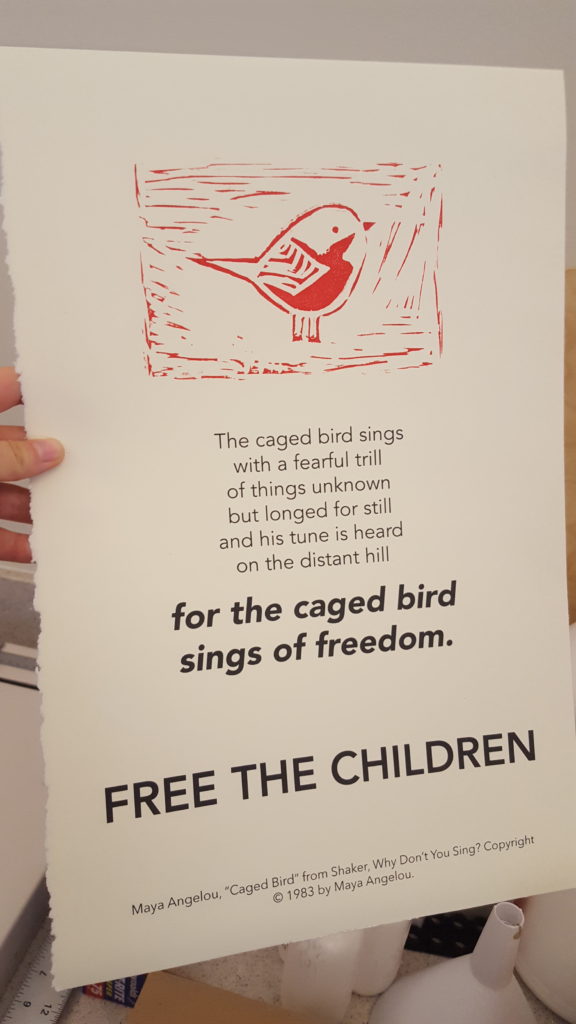 A poster with the text "Free the Children" on the bottom and a stamp of a bird on the top.