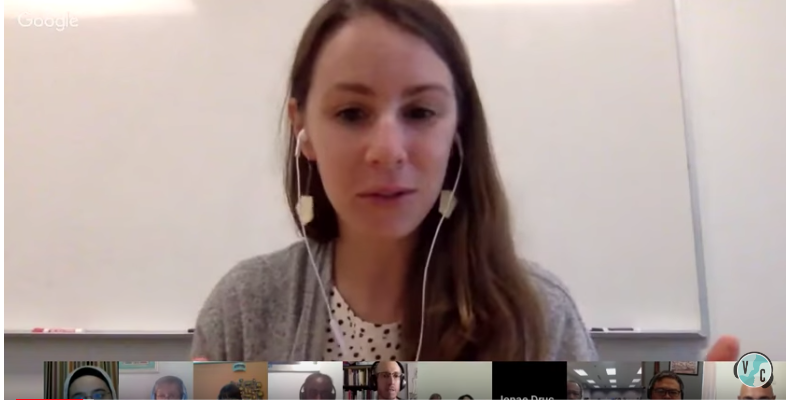 A screenshot of a Google Hangout conversation; Jenae is talking and is the most visible of the faces. There are a series of tiles at the bottom of the screen that show the faces of the other participants.